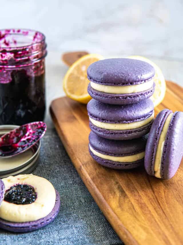 A stack of macarons made using the blueberry macaron recipe.