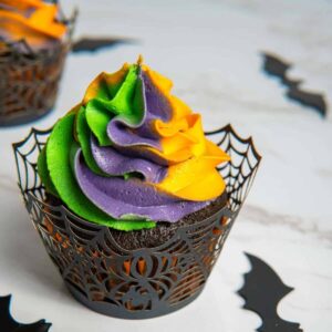 Close-up of easy swirled Halloween cupcakes with a Halloween cupcake wrapper.