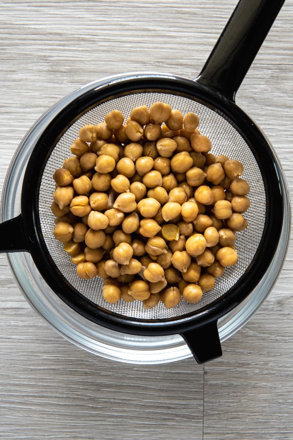 Rinsed garbanzo beans in a bowl.
