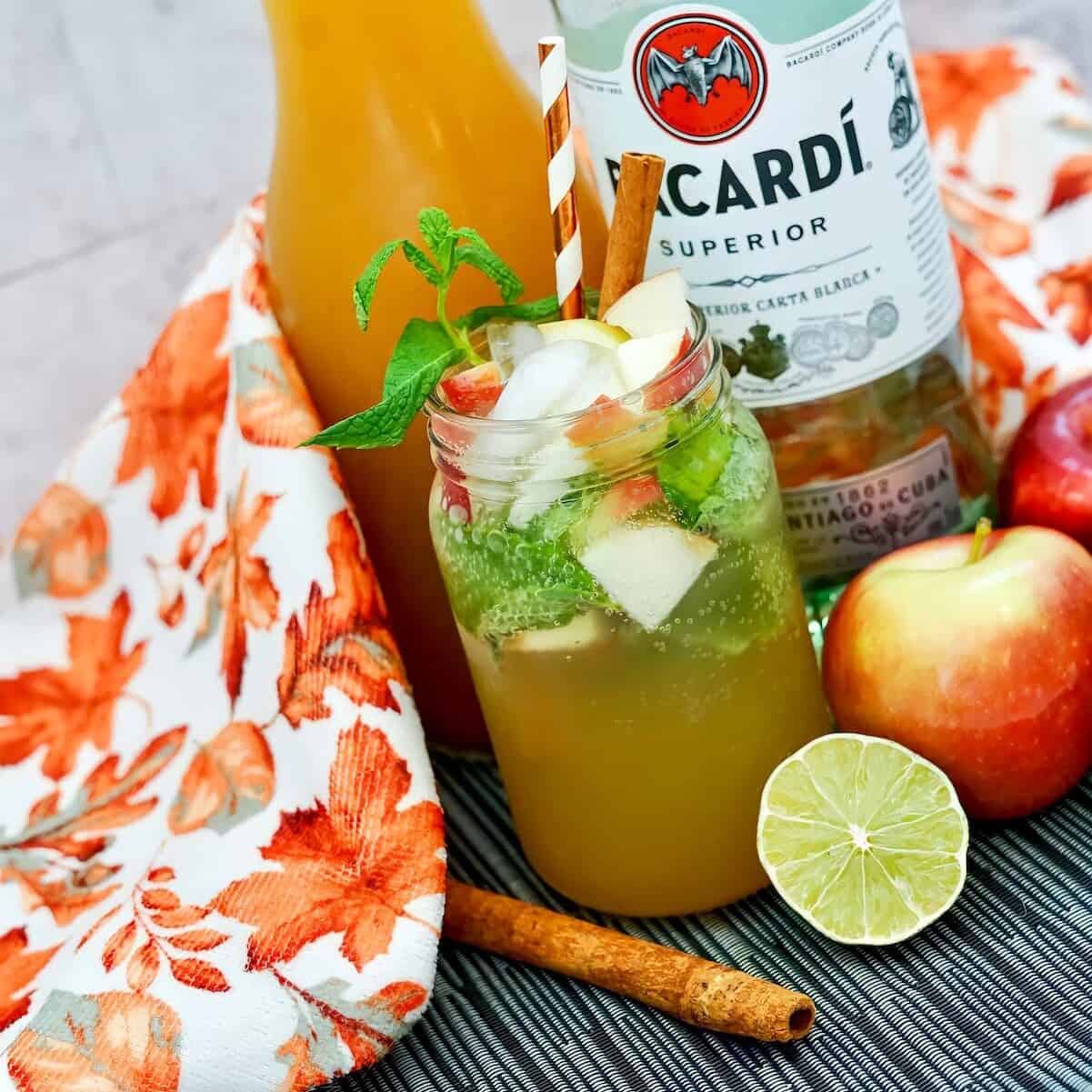 Easy apple cider mojito in a mason jar with Bacardi rum, apples, and apple cider.