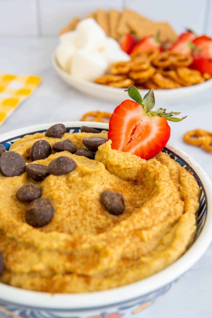 Pumpkin spice hummus with chocolate chips and strawberries