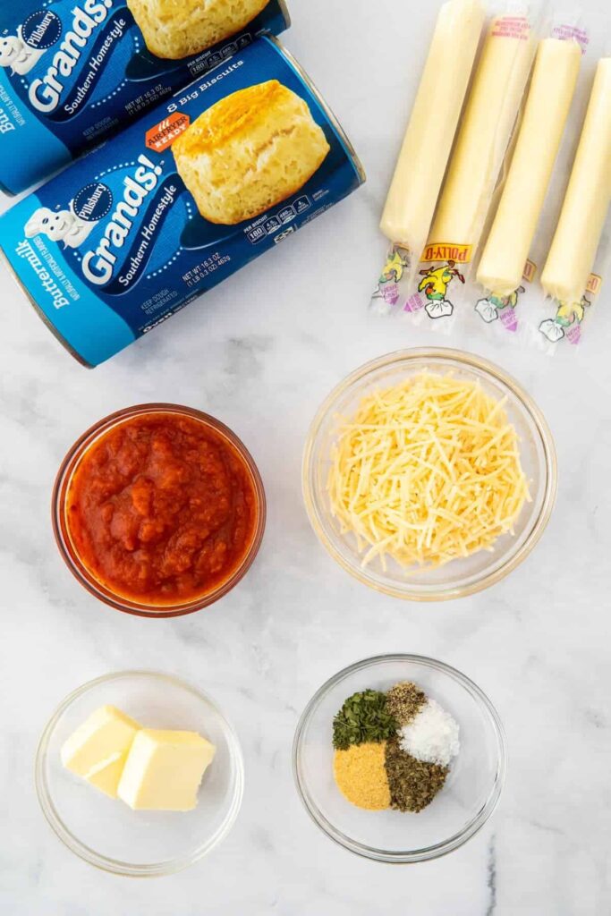 Ingredients needed to make easy cheesy Christmas tree pull apart bread.