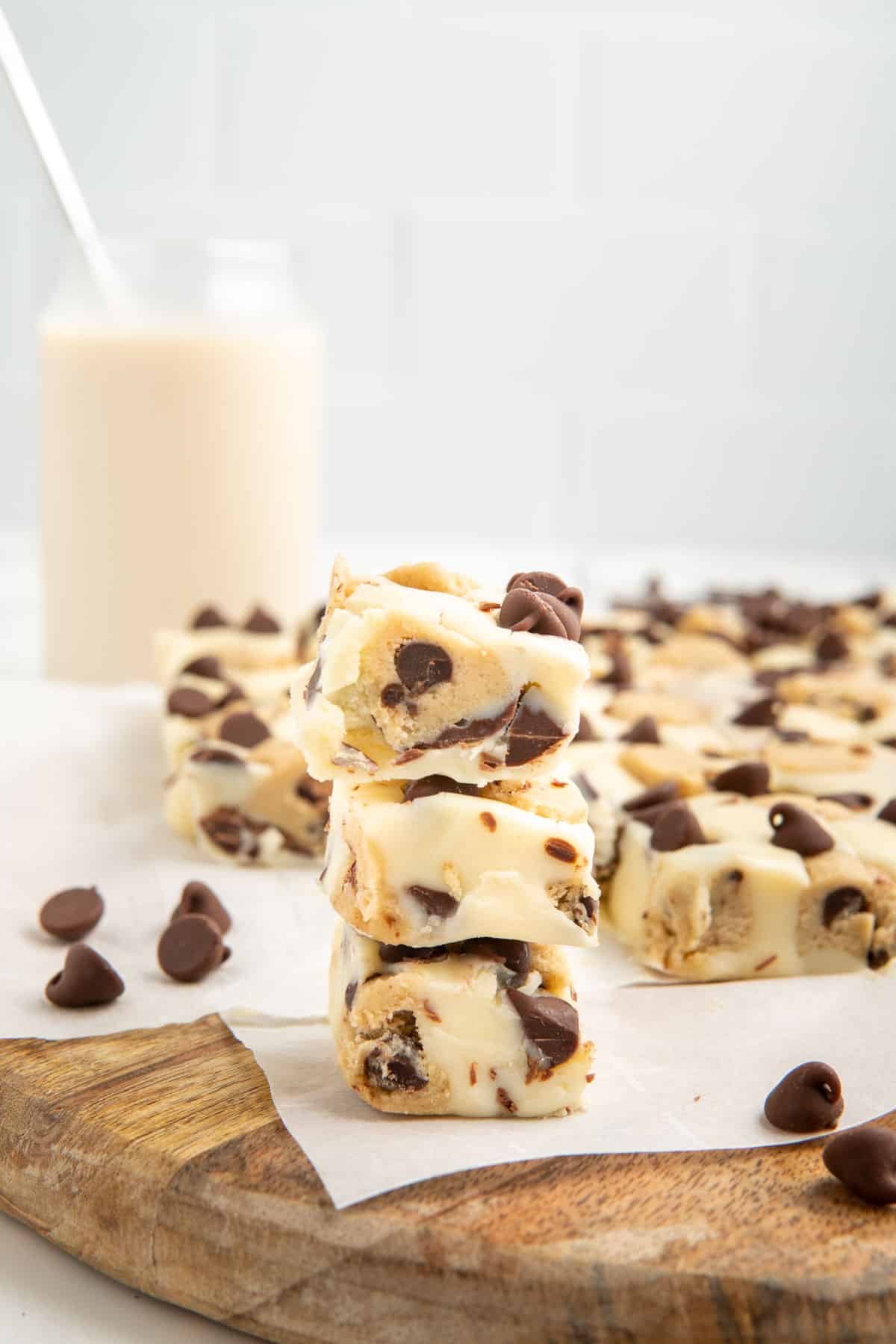 Three pieces of cookie dough fudge stacked vertically.