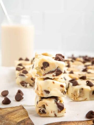 Three pieces of cookie dough fudge stacked vertically.