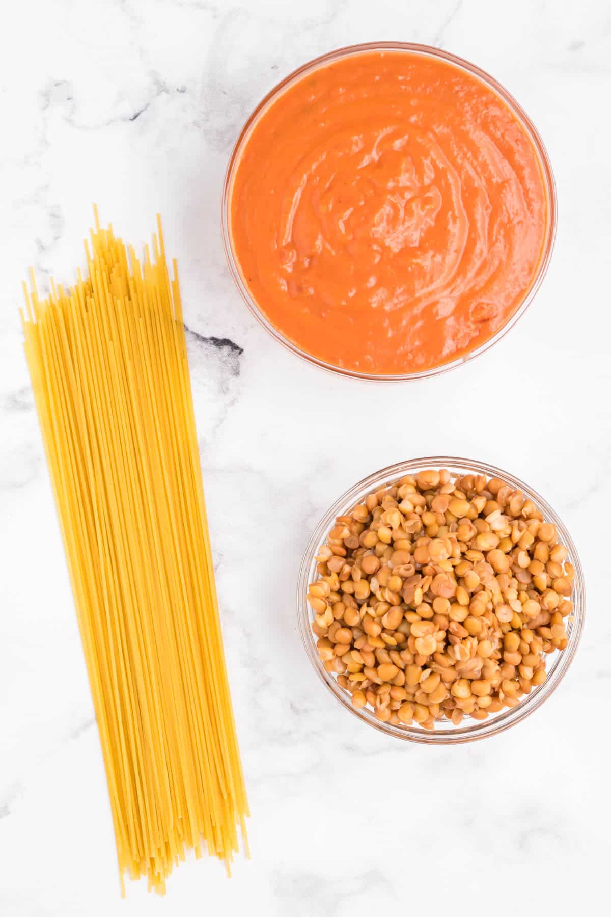 Ingredients needed to make 3 ingredient creamy tomato lentil pasta.
