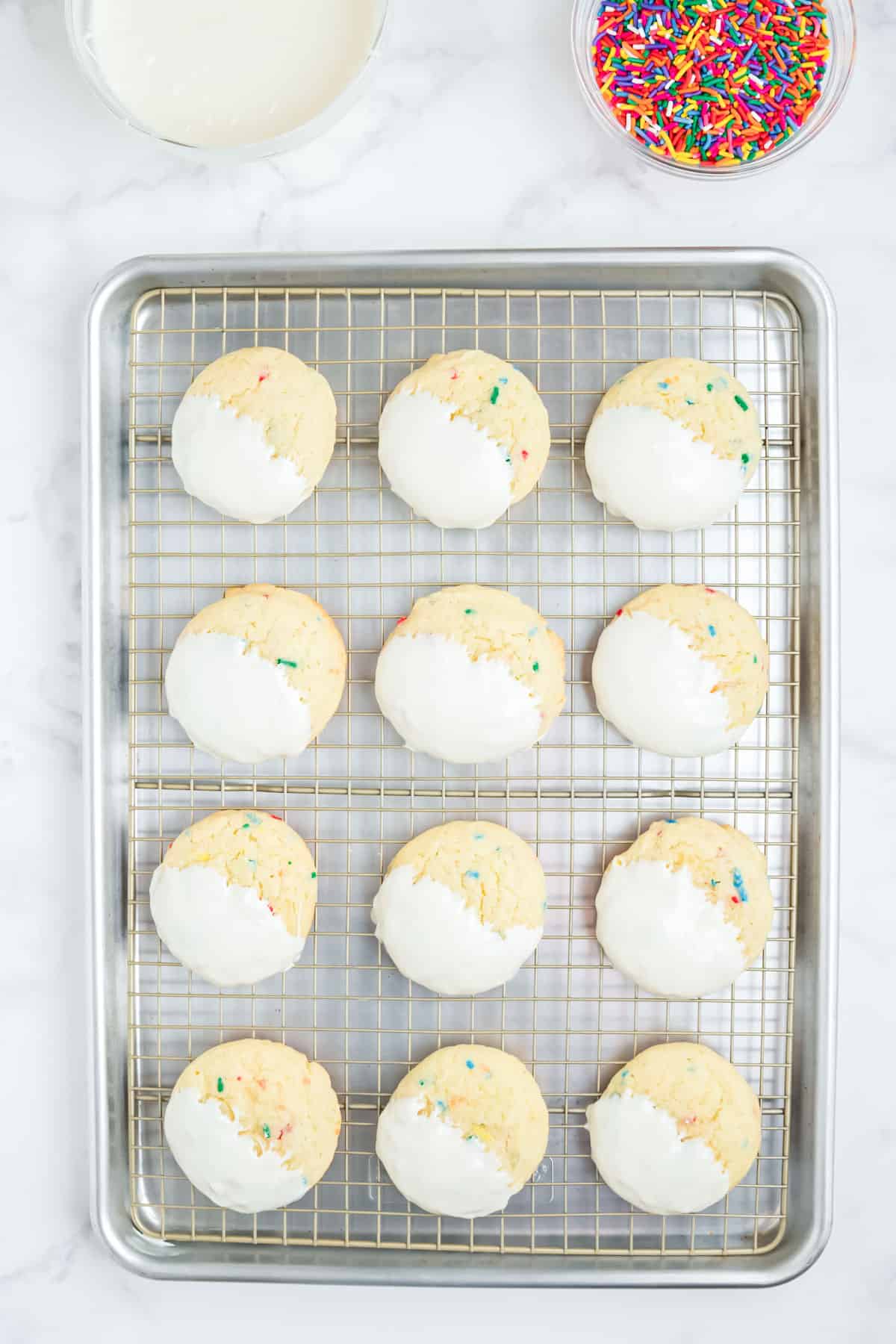 Funfetti cake mix cookies dipped in frosting.