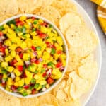 Mango pico de gallo served with tortilla chips.