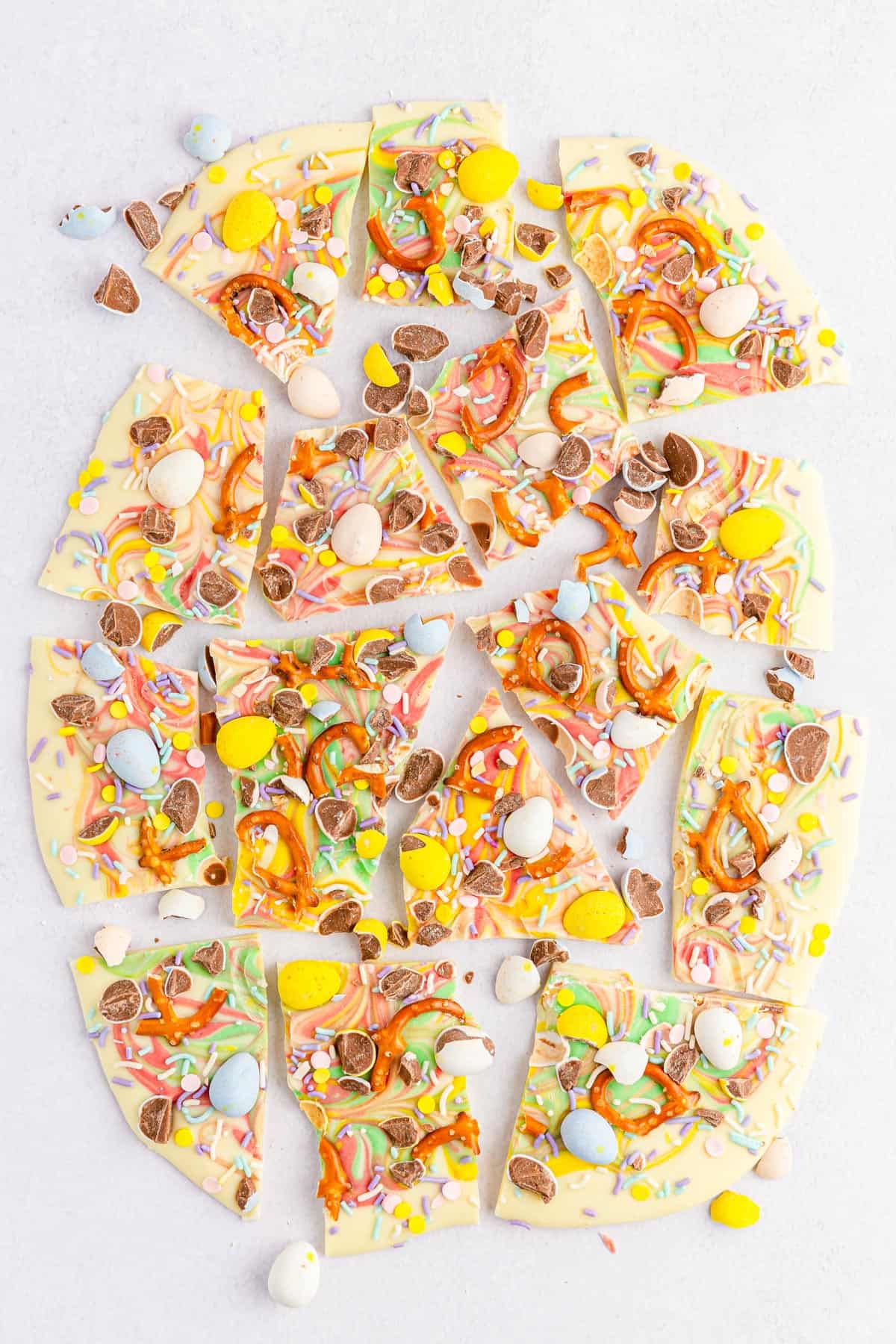 Easter bark broken into pieces on a white background.