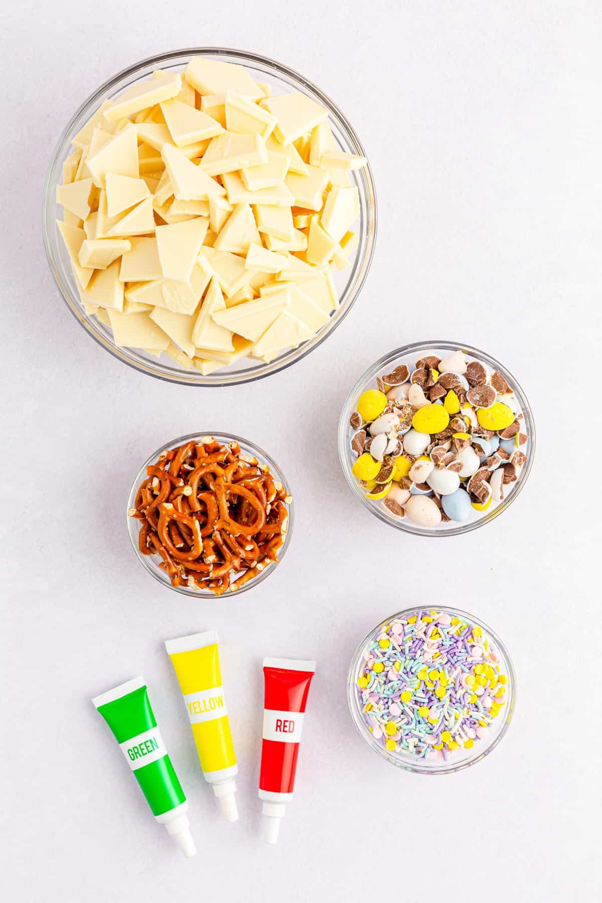 Ingredients needed to make Easter bark with Cadbury mini eggs and pretzels.