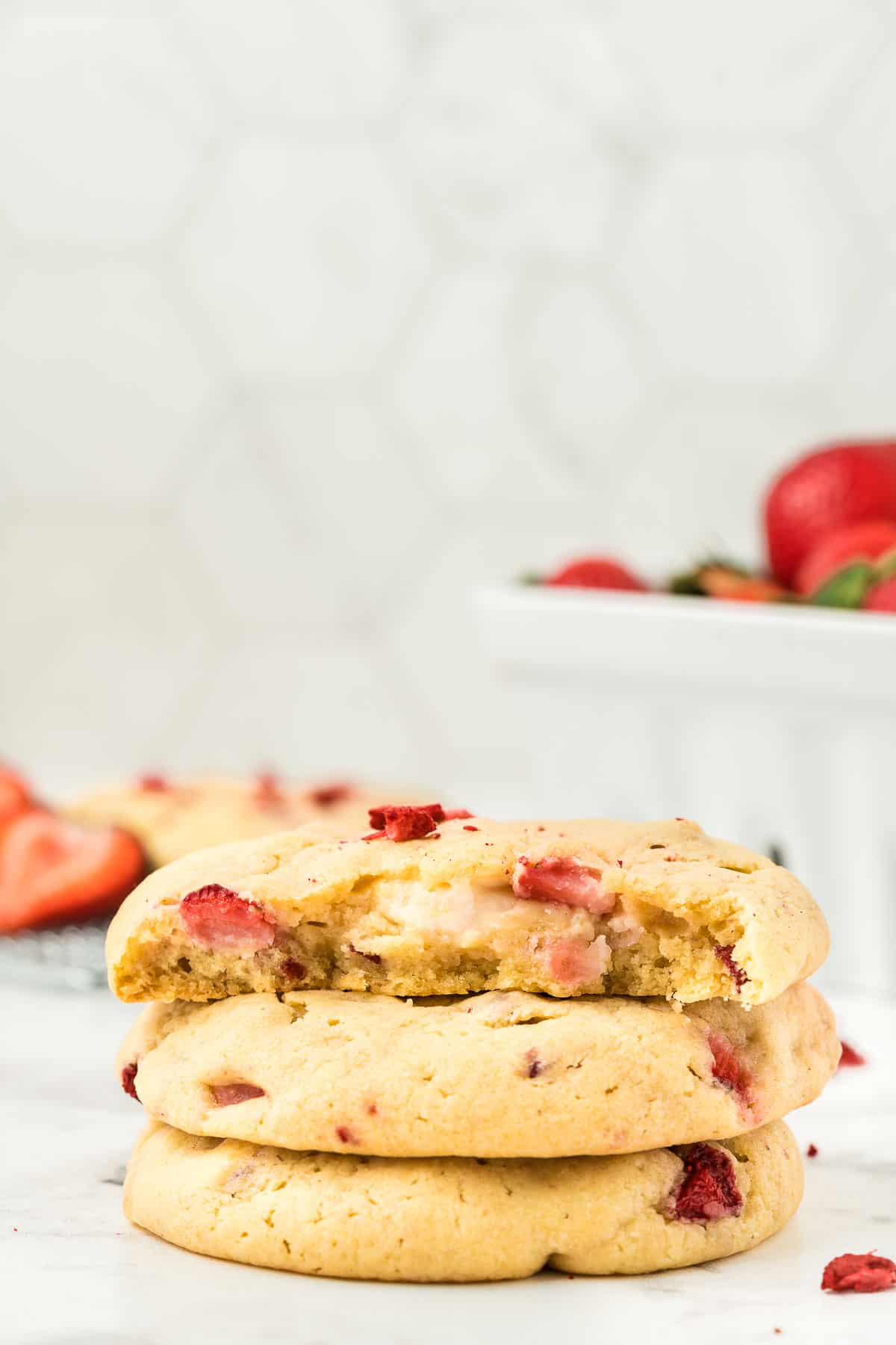 Strawberry cheesecake cookies showing filling.