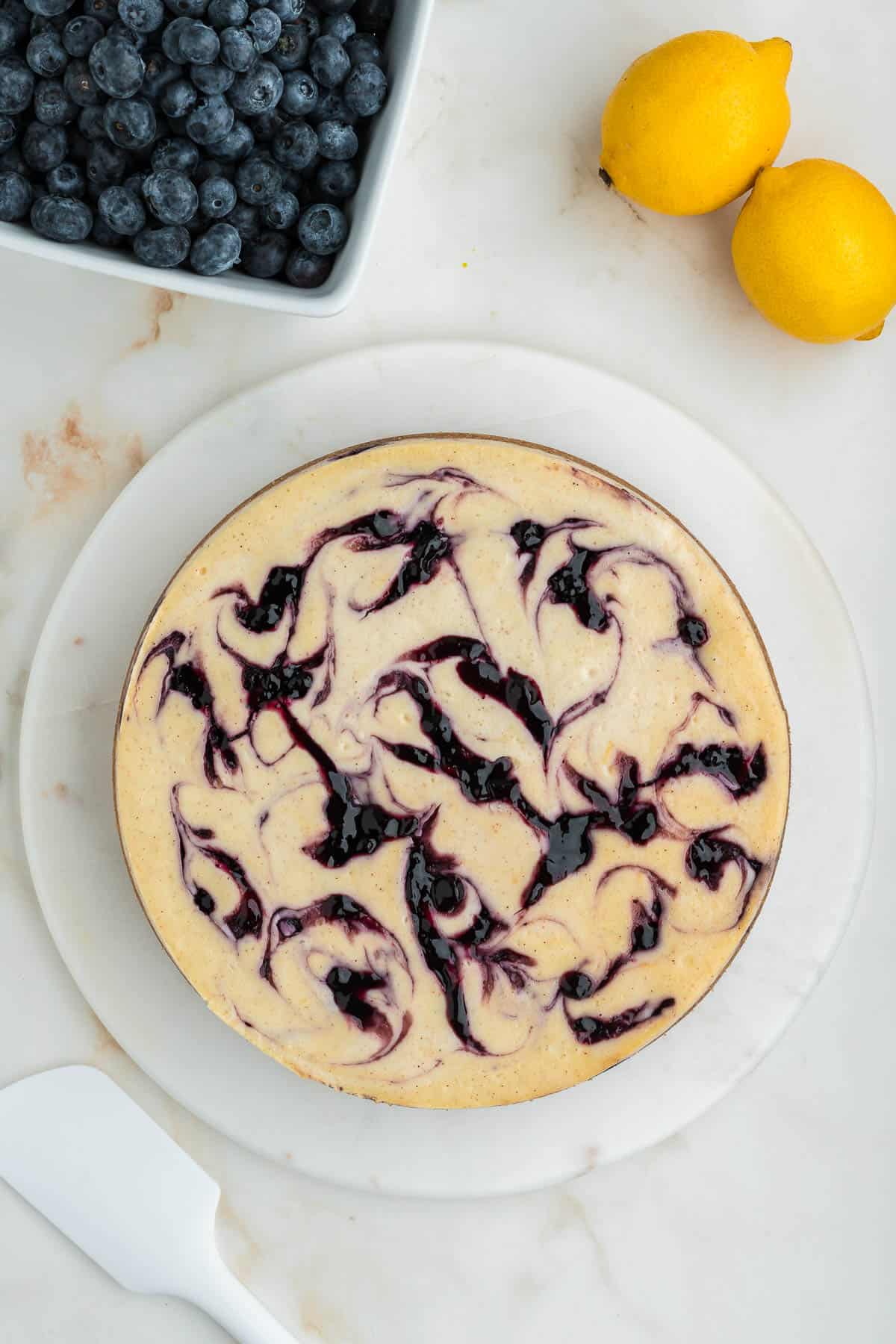 Lemon cheesecake with blueberry marbled through.