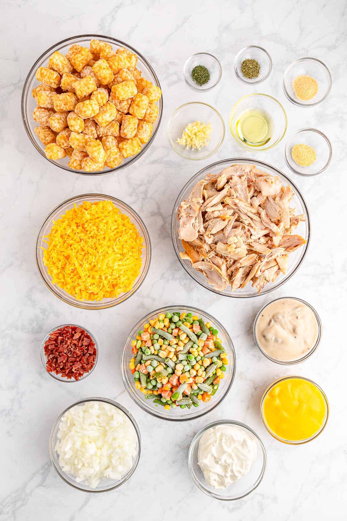 Ingredients needed to make easy cheesy chicken tater tot casserole.